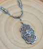 Art Deco pearl pendant necklace with ornate filigree teardrop pendant and chain