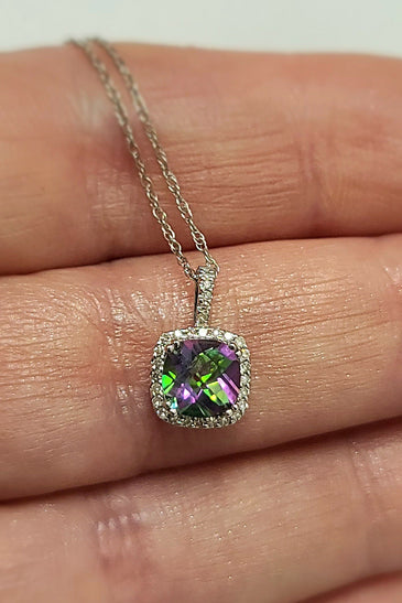 10kt white gold pendent with sparkling topaz and diamond accents