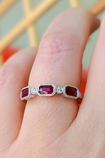 stunning band featuring 14k white gold and emerald cut ruby and diamond
