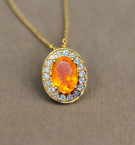extraordinary 14k yellow gold diamond halo fire opal pendent 