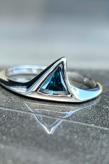 14kt white gold shark fin ring with blue triangular gemstone
