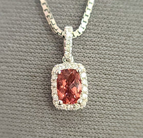 14kt white gold pink tourmaline pendant with oval halo and link chain