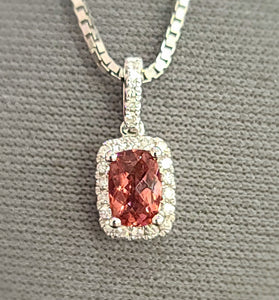 14kt white gold pink tourmaline pendant with oval halo and link chain