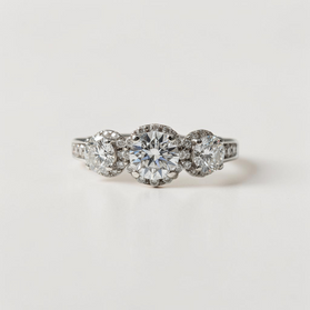 Custom Design by Harold – White Gold Three Diamond Halo Ring