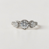 Custom Design by Harold – White Gold Three Diamond Halo Ring