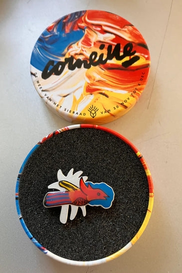 Bird in colors - Unique European designer brooch and clothing.