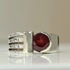 Sterling silver garnet ring with round red stone bezel and three-bar cutout band
