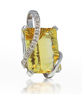 Citrine pendant in white gold with diamond pave accents and prong-set yellow center