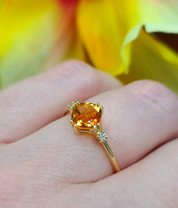 Yellow gold ring with square citrine and small diamond side stones