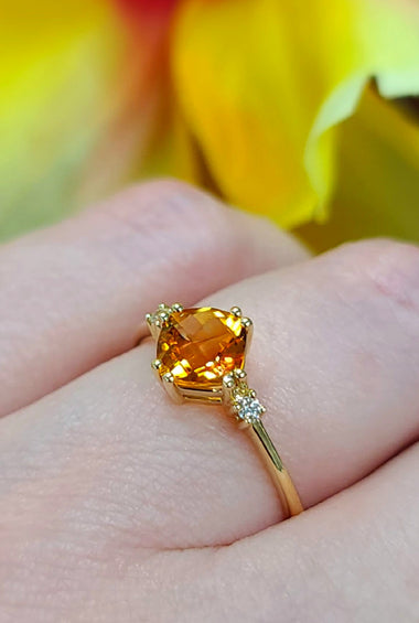 Yellow gold ring with square citrine and small diamond side stones
