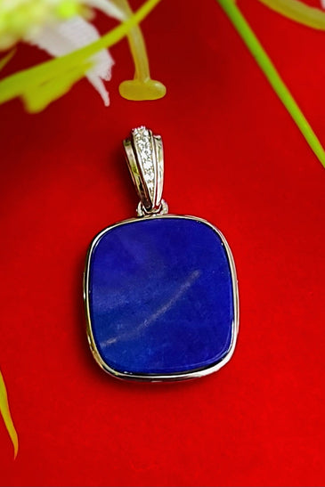 Lapis lazuli square pendant in sterling silver with small bezel-set side stones