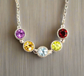 Sterling silver chain necklace with five bezel-set round gems: purple, yellow, blue, lime, red