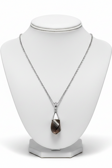 A twisted pear shaped smoky quartz, set on sterling silver