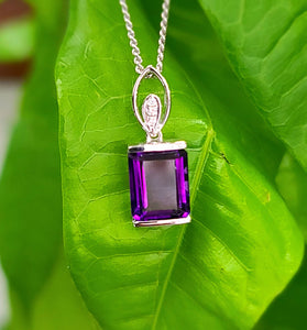 purple amethyst complimented with diamonds on a 14k white gold chain