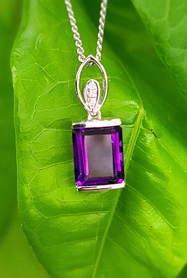purple amethyst complimented with diamonds on a 14k white gold chain