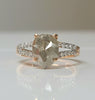 Rose gold ring with pear salt-and-pepper diamond and pavé side stones