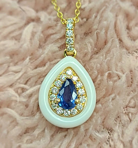 sapphire and diamonds create a luxuries halo pendent