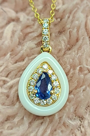 sapphire and diamonds create a luxuries halo pendent