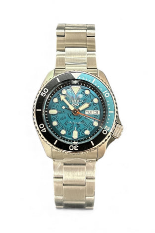 Stainless steel wristwatch with blue dial and rotating bezel, metal link bracelet