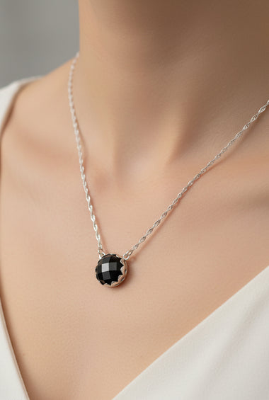 Sterling silver pendant with round black onyx stone on a silver chain
