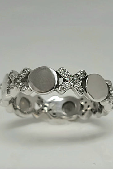 Sterling silver CZ ring with domed round centers and clustered small crystal stones