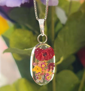 sterling silver necklace featuring a uniquely pressed flower