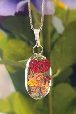 sterling silver necklace featuring a uniquely pressed flower