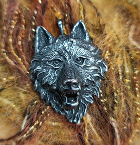 Sterling silver wolf head pendant with detailed facial features