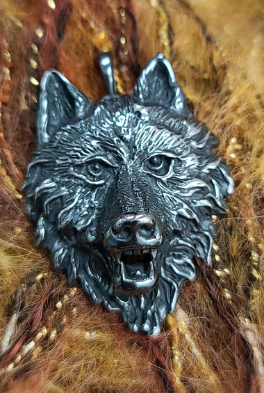 Sterling silver wolf head pendant with detailed facial features
