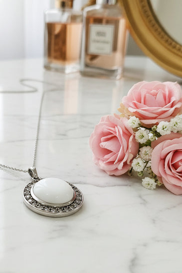 Sterling silver white agate pendant with pave border on silver chain