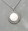 Sterling silver white agate pendant with pave halo and loop bail on chain