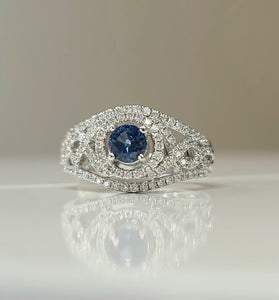 white gold ring with blue sapphire and diamonds fit for royalty