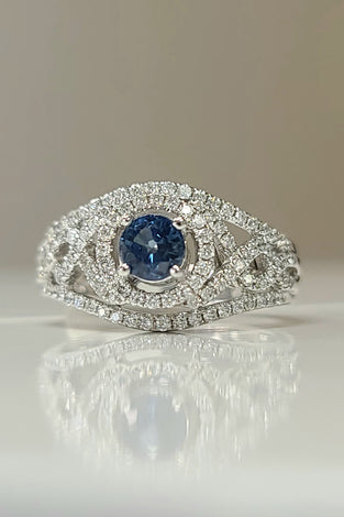 white gold ring with blue sapphire and diamonds fit for royalty