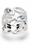 Symmetrical Sterling Silver ovals forming a ring set with blue topaz stones