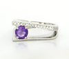 Sterling silver amethyst ring with oval purple gemstone and pavé crystal band