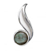 Sterling silver formed in the shape of an 'S', is set with a pearly sheen labradorite