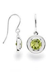 Peridot stones shaped into circles are set in sterling silver