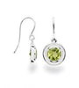 Peridot stones shaped into circles are set in sterling silver