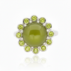 Sterling silver cabochon ring with round green center and peridot stone halo