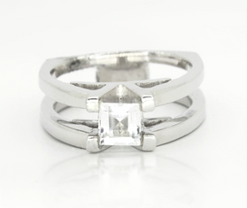 Sterling silver ring with rectangular white topaz centerpiece and side accents