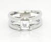 Sterling silver ring with rectangular white topaz centerpiece and side accents
