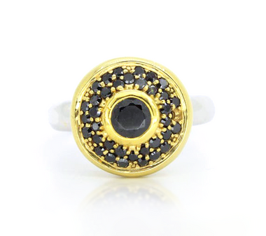 Round black zircon ring with dark center stone and black halo, gold-tone top