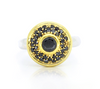 Round black zircon ring with dark center stone and black halo, gold-tone top