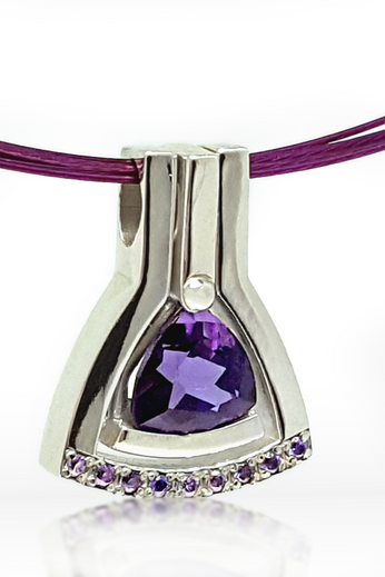 Sterling silver amethyst pendant with purple teardrop stone and halo