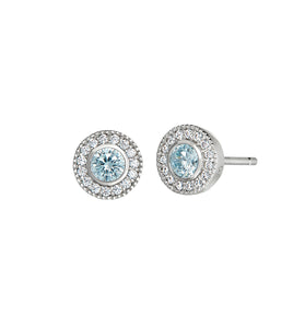 Round aquamarine halo stud earrings in sterling silver with clear pavé border.