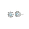 Round aquamarine halo stud earrings in sterling silver with clear pavé border.
