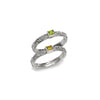 Sterling silver ring with ornate band and square green and yellow gemstones