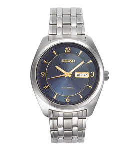 Men's Seiko automatic watch with blue dial, gold hands, and steel bracelet