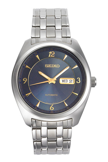 Men's Seiko automatic watch with blue dial, gold hands, and steel bracelet