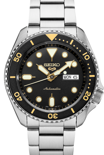 Men's Seiko watch with black dial, gold markers, and stainless steel bracelet